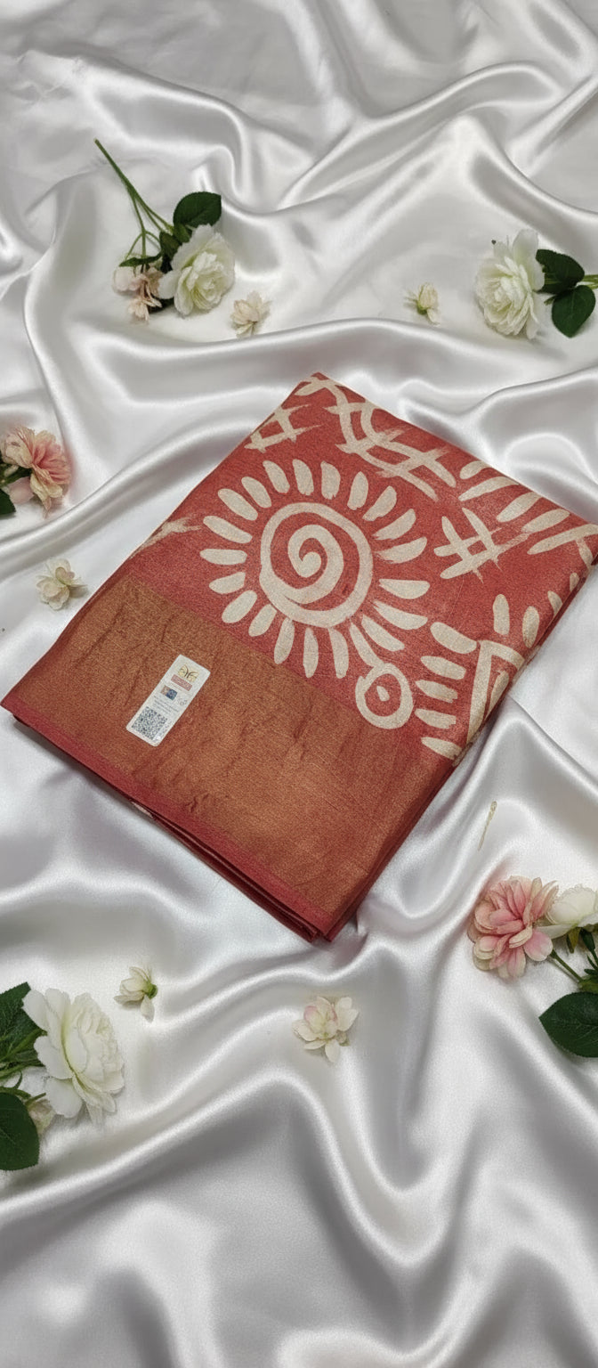 tussar with bright orangish red batik print saree use white satin as background