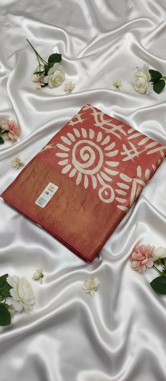 tussar with bright orangish red batik print saree use white satin as background